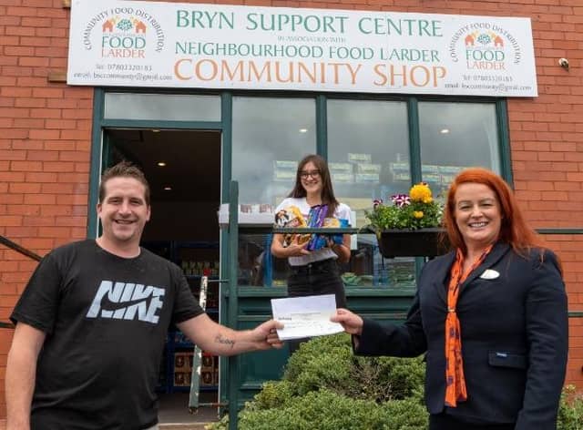 Coun Steve Jones with Bellway's sales advisor Kerry Serrio