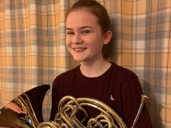 French horn player Cora Heyes won the Advanced Section