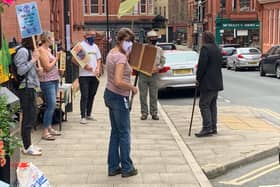 XR Wigan activists hold a vigil outside the town hall