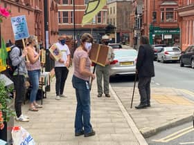 XR Wigan activists hold a vigil outside the town hall