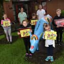Hayley Kearns, director of One Together CIC, back left, with deputy headteacher Greg Hale. back right, and pupils from Aspull Church Primary School
