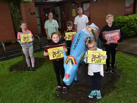 Hayley Kearns, director of One Together CIC, back left, with deputy headteacher Greg Hale. back right, and pupils from Aspull Church Primary School