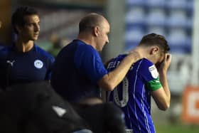 Paul Cook with Joe Williams in midweek
