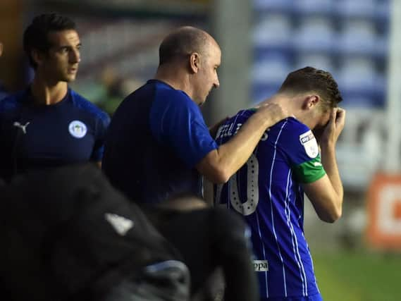 Paul Cook with Joe Williams in midweek