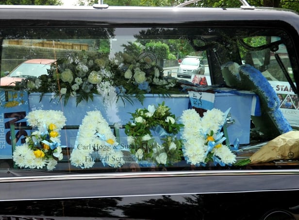 A blue coffin marked Jack's love of Manchester City