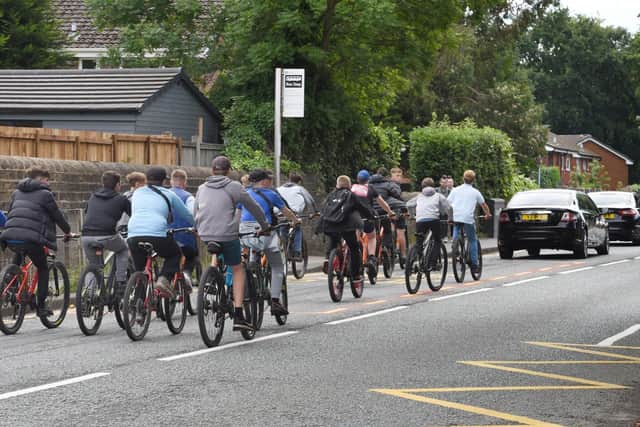 Friends cycled behind the hearse as it made its way to the church