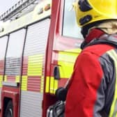 The fire service attended the crash scene and treated a woman for her injuries