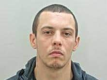 Curtis Fox, 24, who is still wanted by police