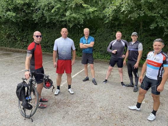 Ian Twigg and his team of cyclists who rode 100km for the hospice
