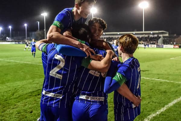 The Latics Under-18 side celebrate thrashing Birmingham  in the FA Youth Cup