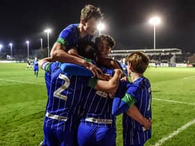 The Latics Under-18 side celebrate thrashing Birmingham  in the FA Youth Cup