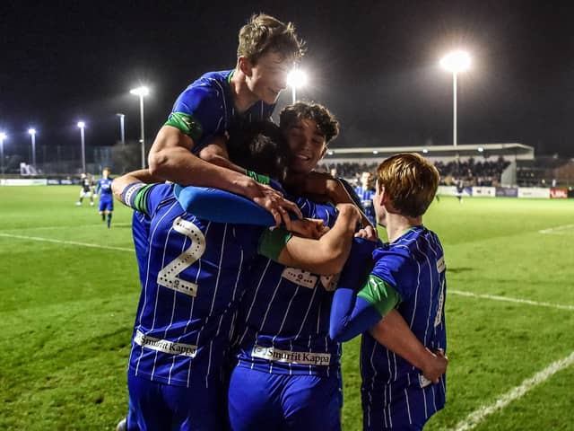 The Latics Under-18 side celebrate thrashing Birmingham  in the FA Youth Cup