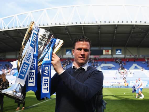 Gary Caldwell with the League One trophy