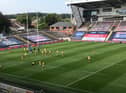 Wigan players warming up