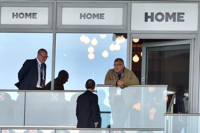 England and ex-Wigan coach Shaun Wane watches on
