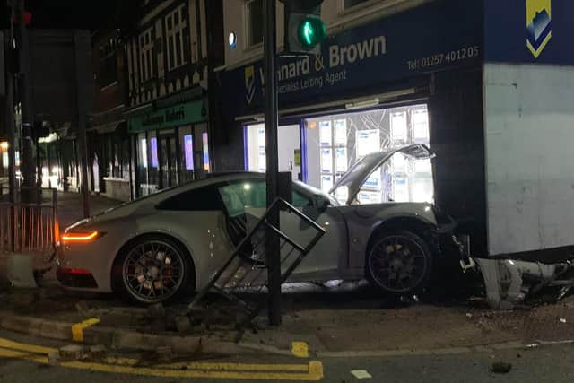 Railings were damaged before the car hit the building. Picture by Jake Ruddick