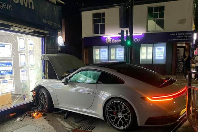 Both the car and window were damaged. Picture by Jake Ruddick