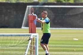 Leam Richardson, Paul Cook's former assistant, wipes down equipment when the squad returned after the lockdown in early summer. He will take charge of training