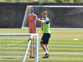 Leam Richardson, Paul Cook's former assistant, wipes down equipment when the squad returned after the lockdown in early summer. He will take charge of training