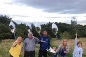 Relatives let off the balloons, one of which was found in Denmark