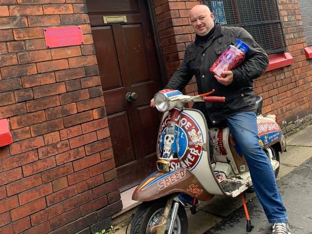 Darren outside the sweet factory