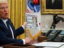U.S. President Donald Trump speaks in the Oval Office before signing an executive order related to regulating social media on May 28
