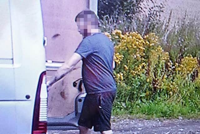 The man caught on camera unloading the tyres from a van at Haydock Park Farm