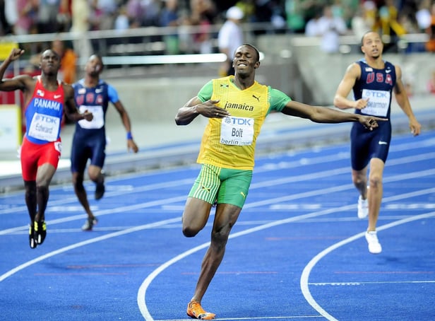 Jamaica's Usain Bolt sets a new World Record to win the Men's 200m Final during the IAAF World Championships at the Olympiastadion, Berlin on August 20, 2009