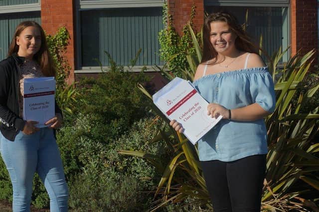 Dean Trust pupils Keisha and Kacey collect their results