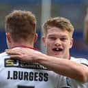 Smithies congratulates try-scorer Joe Burgess