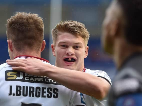 Smithies congratulates try-scorer Joe Burgess