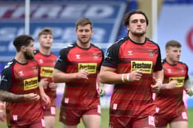Wigan players warming up last Saturday