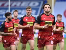Wigan players warming up last Saturday