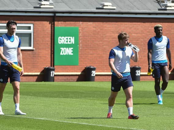 Latics players training at Euxton before the sale