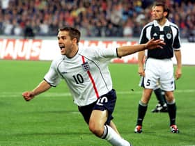 Michael Owen celebrates scoring his second goal against Germany