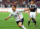 Michael Owen celebrates scoring his second goal against Germany