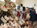Justin Hinden with some of the homemade Christmas items for sale