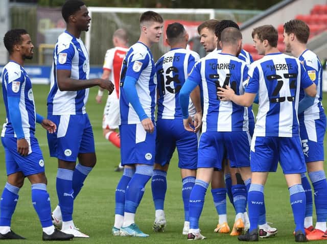 Joe Garner gets the congratulations after putting Latics ahead at Fleetwood