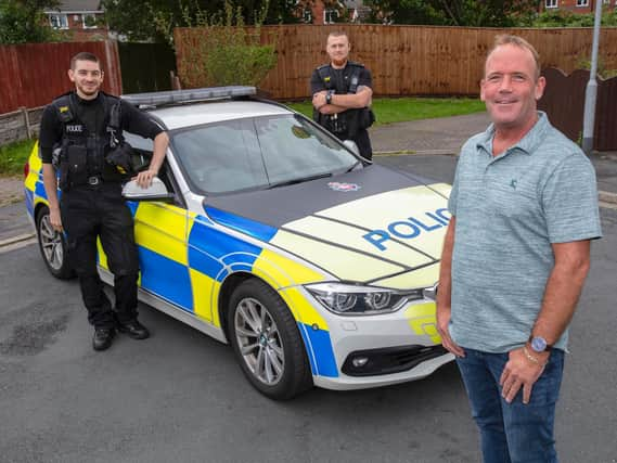 PC Chris Pixton and PC Patrick Geoghegan-Shaw pictured with Shane Sharkey