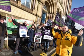 Workers on the picket line earlier in the dispute