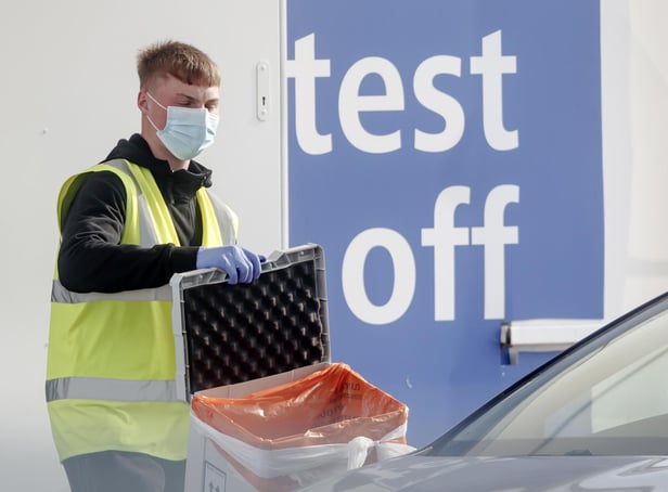 A worker at a Covid-19 test centre. Cases are rising across the country