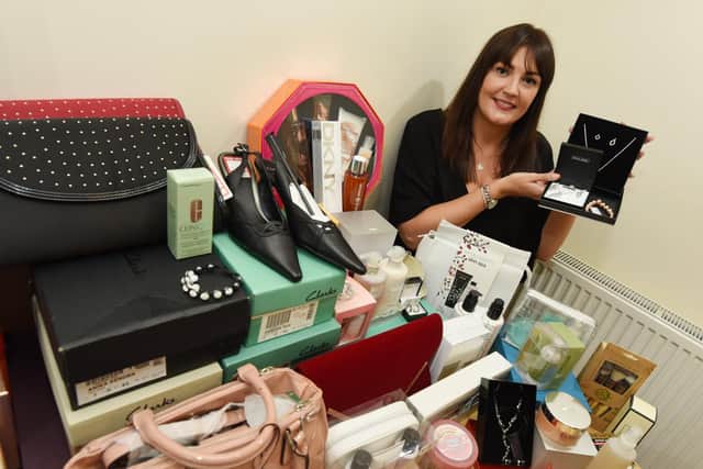 Rebecca Cunningham with some of the items which were auctioned