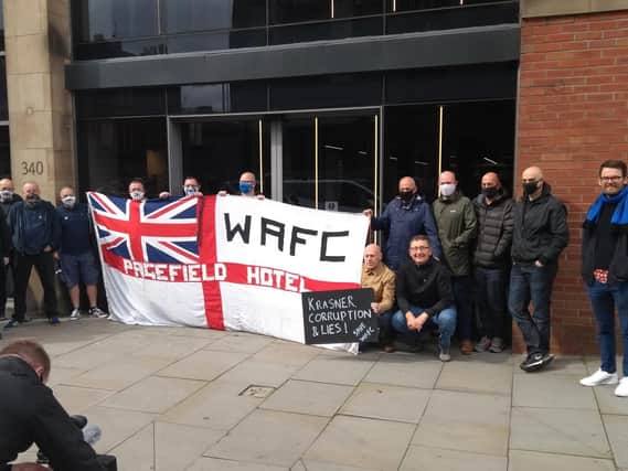 Members of the Wigan Athletic Grievance Society during their peaceful demonstration outside the Begbies Traynor offices in Manchester