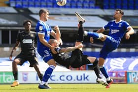 Joe Garner hits the bar with his early bicycle kick