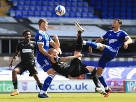 Joe Garner hits the bar with his early bicycle kick