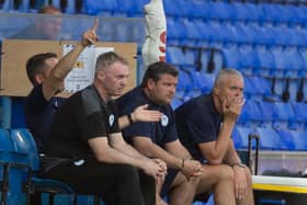 The Latics bench at Ipswich on Sunday