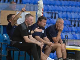 The Latics bench at Ipswich on Sunday