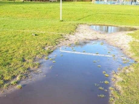 The waterlogged state of the Ashfield Park pitch