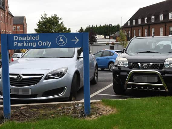 A complaint about disabled parking at Wigan Infirmary is being investigated