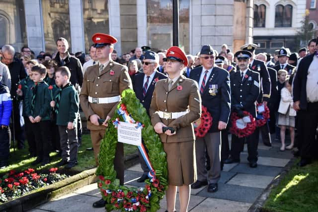 Paying respects at last year's Remembrance Day service in Wigan